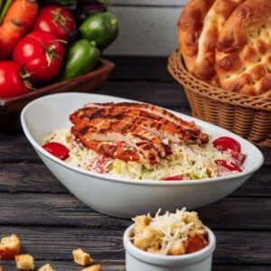 Full Plate With Rice, Roast Potato, Greek Salad, Sliced Pita And Tzatziki Sauce