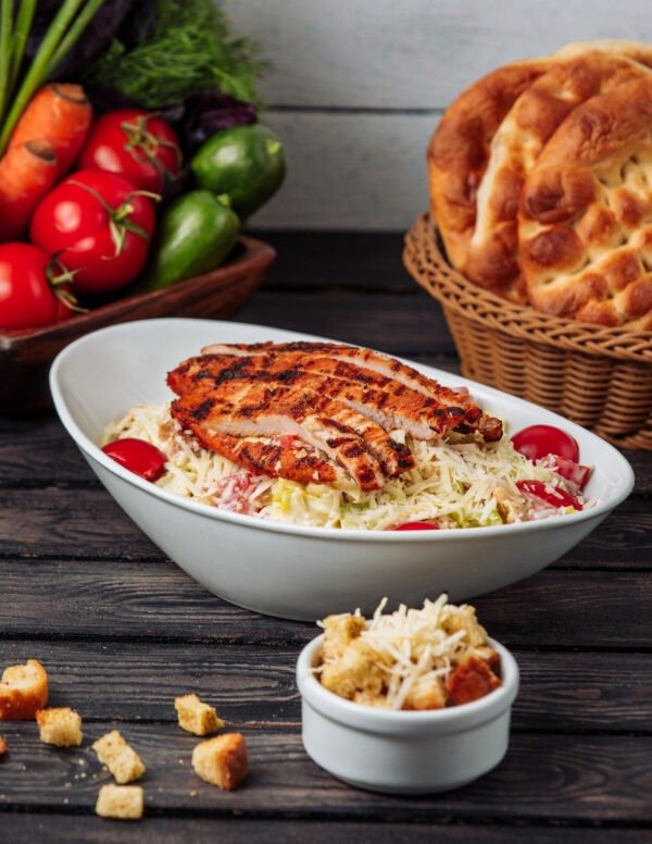 Full Plate With Rice, Roast Potato, Greek Salad, Sliced Pita And Tzatziki Sauce