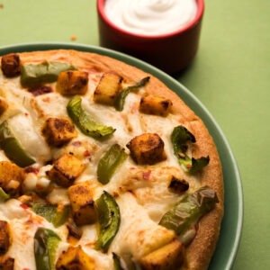 Tandoori chicken, Green Peppers, Tamotoes, Onion, Pizza Sauce & Mozzarello Cheese.